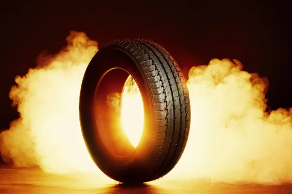 Photo of black smoked burning tire