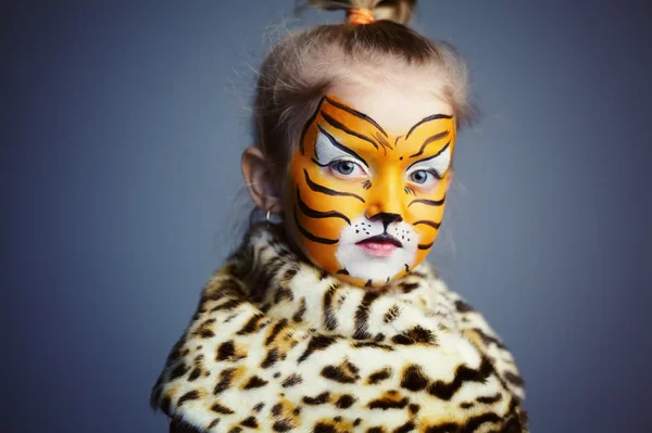Little girl with tiger costume