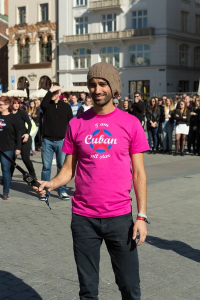 International Flashmob Day of Rueda de Casino, 57 countries, 160 cities. Several hundred persons dance Hispanic rhythms on the Main Square in Cracow. Poland