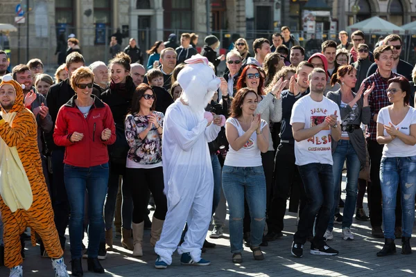 International Flashmob Day of Rueda de Casino, 57 countries, 160 cities. Several hundred persons dance Hispanic rhythms on the Main Square in Cracow. Poland