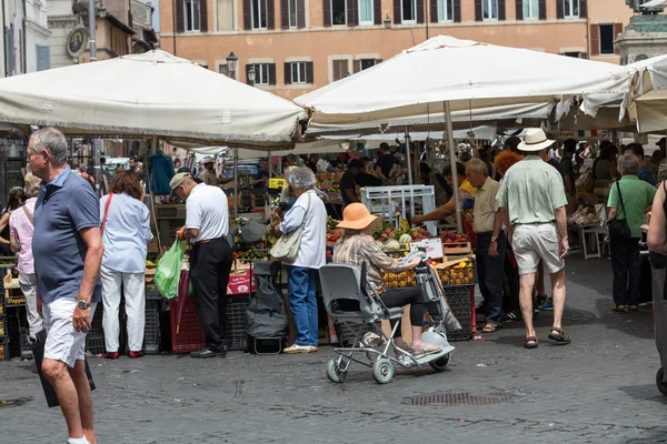 Fresh fruits and vegetables for sale in Campo de Fiori, famous outdoor market in central Rome.