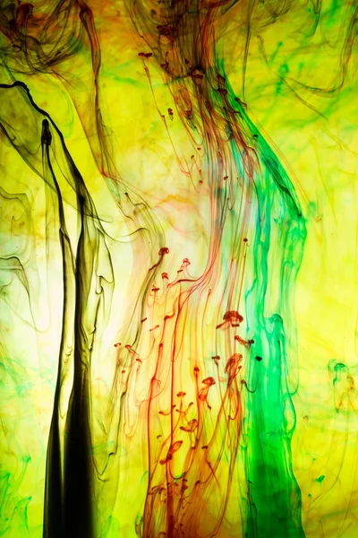 Acrylic colors and ink in water. Abstract background.