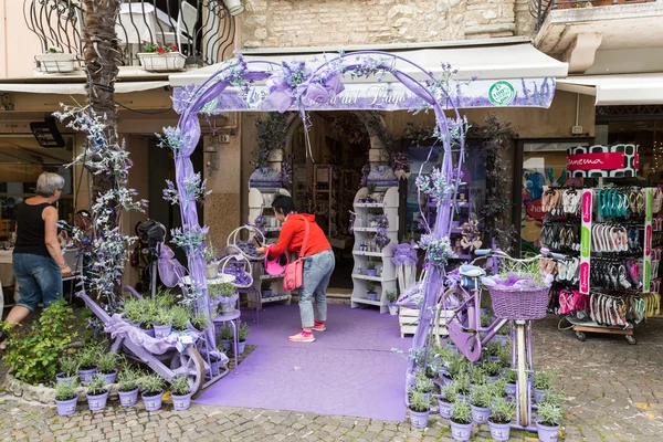 Sirmione, Italy. Show-window the  shop of perfumery and spirits from a lavender. Italy takes the second place in the world on production of oil of a lavender