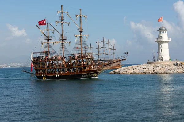 Tourists enjoying sea journey on vintage sailships  in Alanya, Turkey.