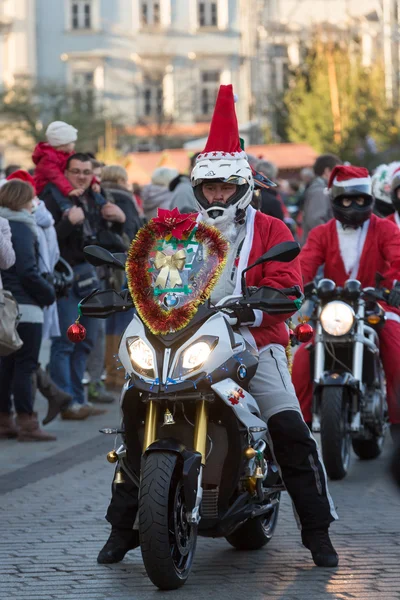 The parade of Santa Clauses on motorcycles around the Main Market Square in Cracow.