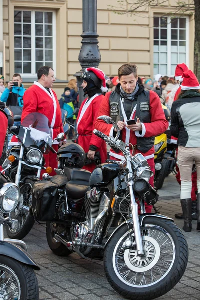 The parade of Santa Clauses on motorcycles around the Main Market Square in Cracow.