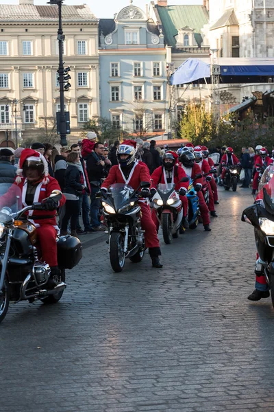 The parade of Santa Clauses on motorcycles around the Main Market Square in Cracow. Poland