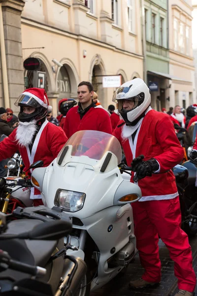 The parade of Santa Clauses on motorcycles around the Main Market Square in Cracow. Poland