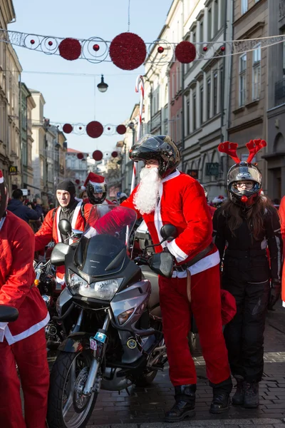 The parade of Santa Clauses on motorcycles around the Main Market Square in Cracow. Poland