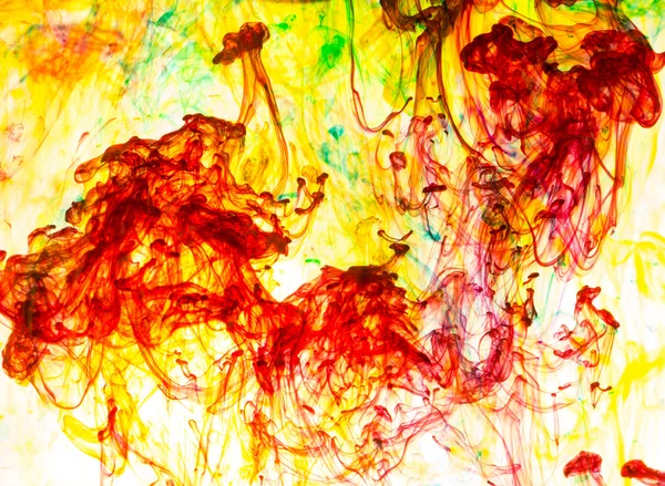 Acrylic colors and ink in water. Abstract background.