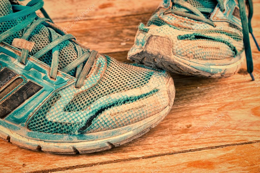 Destroyed sneakers — Stock Photo © OlafSpeier 53079901
