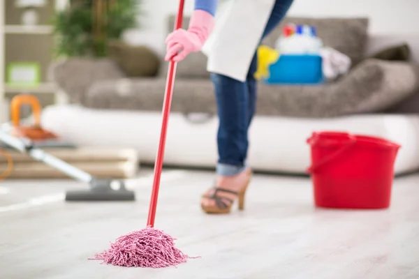 Woman Mopping floor