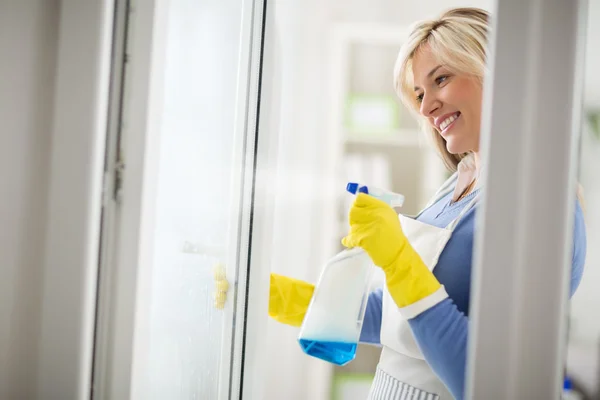 Housewife easy wash windows with appropriate cleanser
