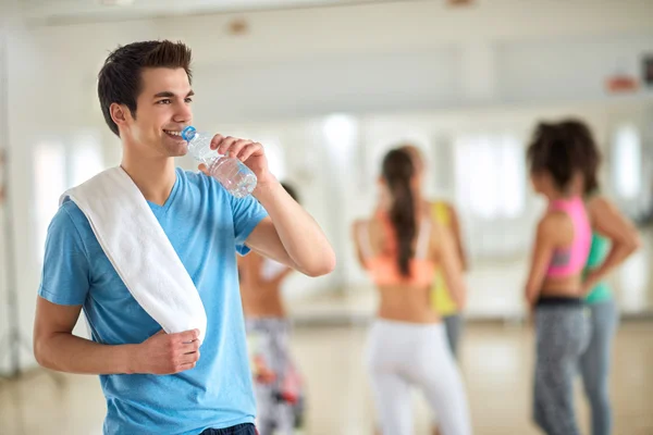 Man drink water after training