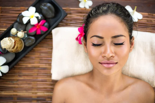 Woman relaxing in spa salon smiling relaxing with eyes closed