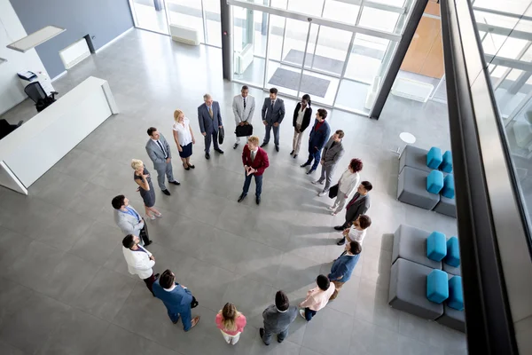 Manager hold company meeting in company hall