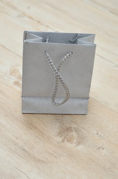 A silver gift bag