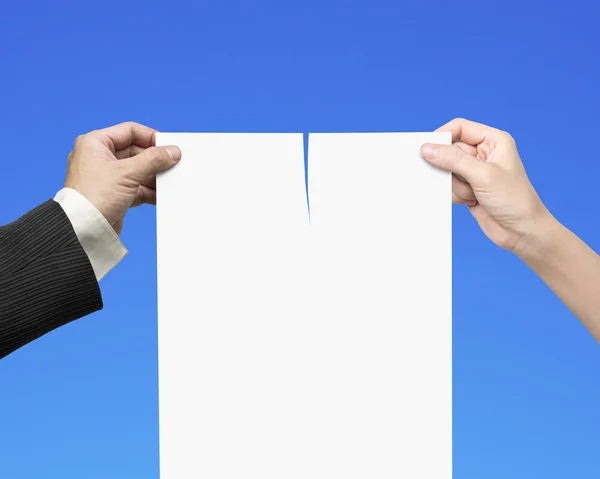 Man and woman hands tearing contract paper with blank