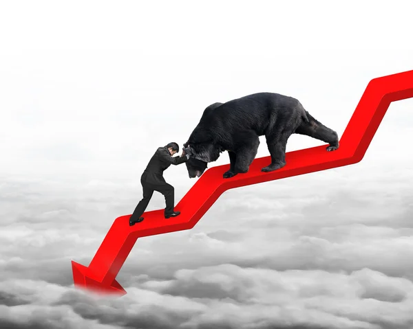 Businessman against bear on arrow downward trend line with cloud