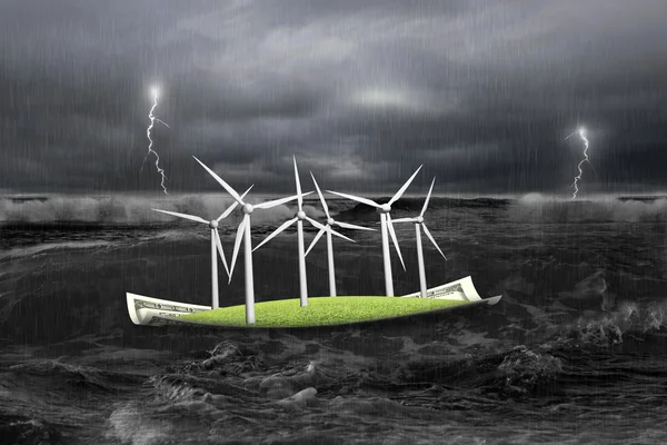 Wind turbines on money boat in dark with storm