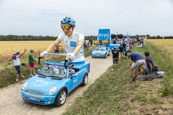 Krys Caravan on a Cobblestone Road- Tour de France 2015