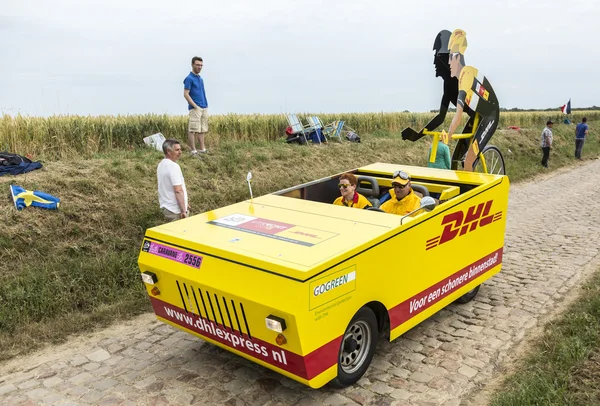 DHL Vehicle on a Cobblestone Road- Tour de France 2015