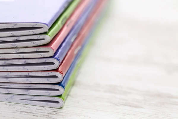 Stack of colorful notebooks
