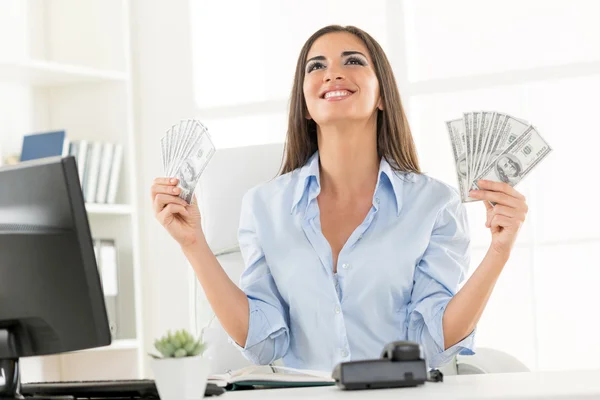 Happy Businesswoman Holding Money