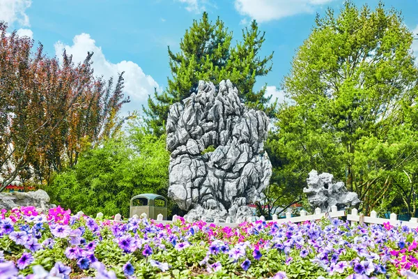 Typical Chinese garden,  park with bizarre rocks. Beijing.
