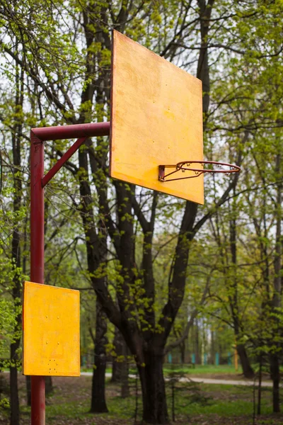 Yellow basketball backboard with ring