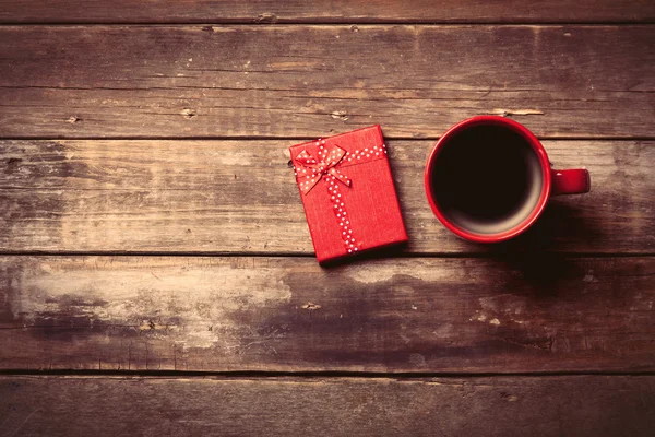 Cup of coffee and gift