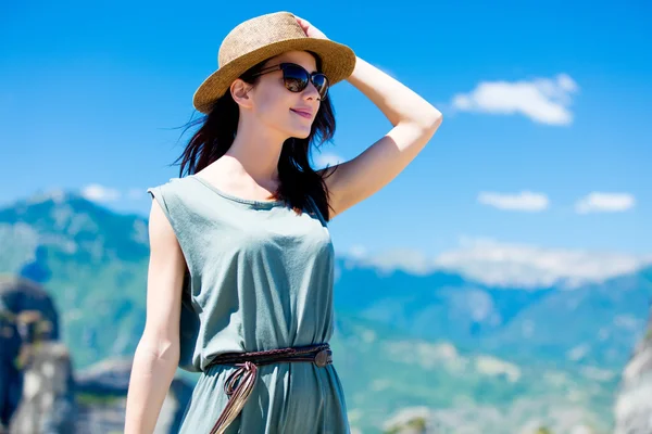 Woman looking at the splendid view in Greece