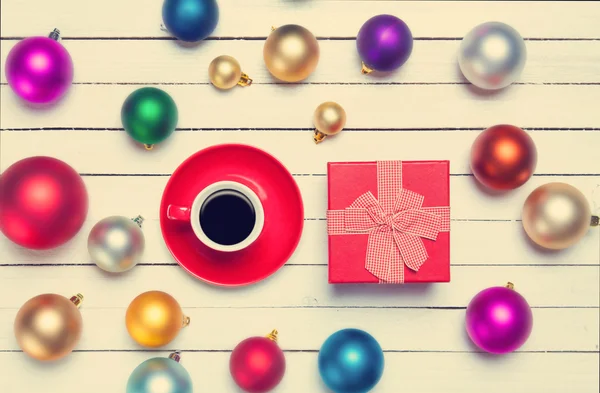 Christmas gifts toys and cup of coffee with gift.
