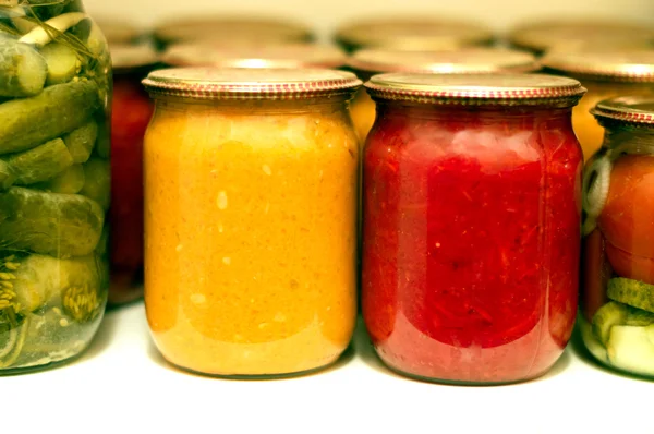 Various canning vegetables in glass jar