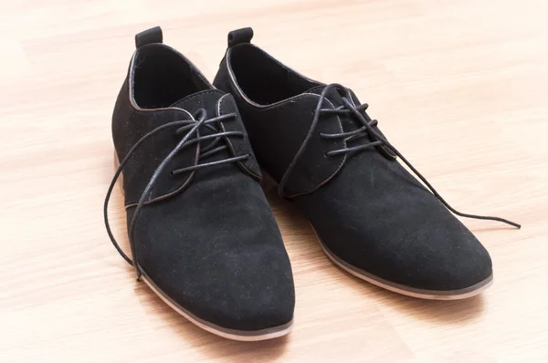 Black suede shoes with laces