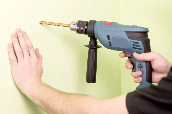 Holding  in hands Electric drills