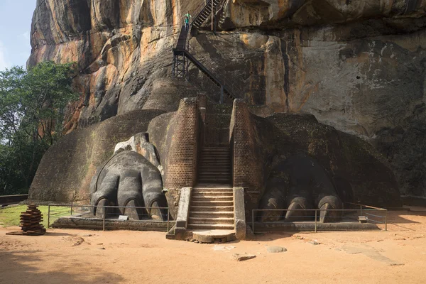 Lion\'s paws at the beginning of the climb to the top of the cliff. Sigiriya, Sri Lanka