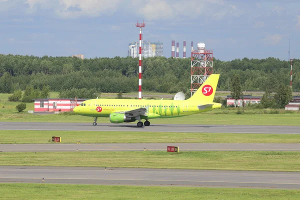 The plane of the company S7 Siberia Airlines Airbus A319 (VP-BHP) on the runway of the Pulkovo airport. St. Petersburg