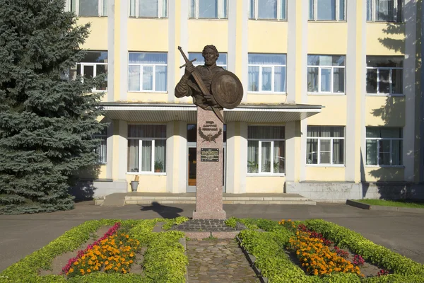The monument to Prince Dmitry Pozharsky on the background of the building of administration of the settlement Borisoglebsky. Yaroslavl region