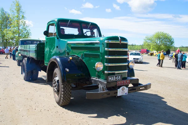 Old diesel truck Sisu - participant of the parade of vintage cars. Kerimyaki, Finland