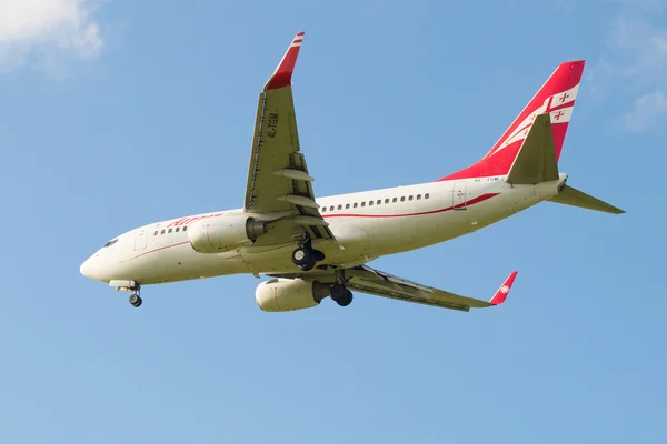 The Boeing 737-700 (4L-TGM) of the company Georgian Airways before landing in Pulkovo airport