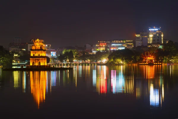 Night panorama of the lake of the returned sword. The historical center of Hanoi. Vietnam