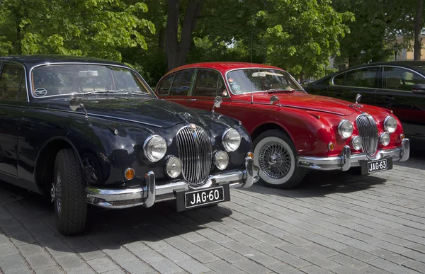 Two car Jaguar Mk.-1 50-ies at the show-the parade of the vintage cars. Turku, Finland