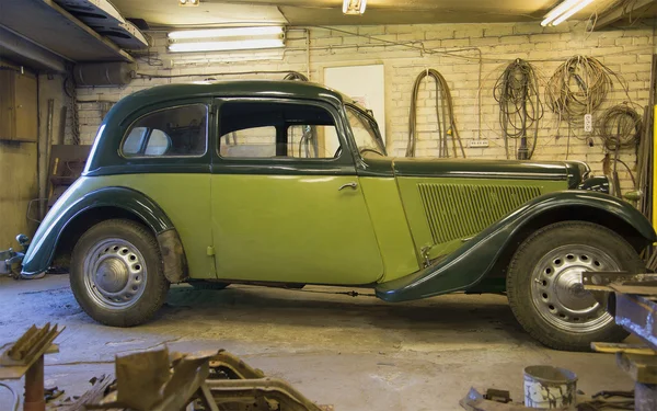 The car Adler Trumpf Junior 1937 v. in the garage before restoration