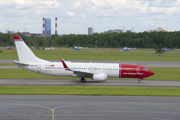 The Boeing 737-800 (LN-NHB) Norwegian Air Shuttle on the runway at Pulkovo airport. St. Petersburg