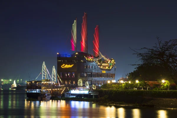 Scarlet sails over Saigon. Sightseeing sailing ship restaurant. Vietnam