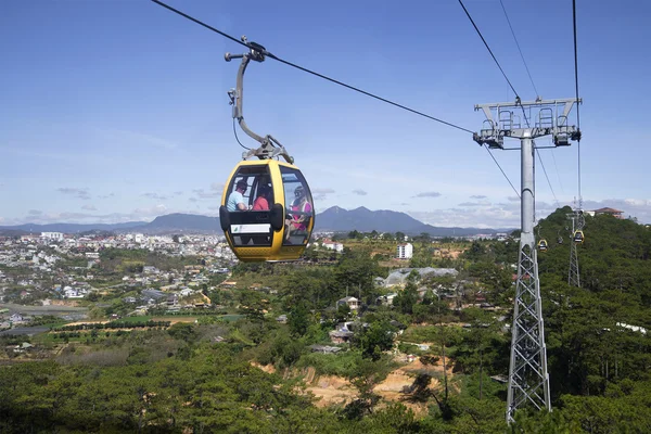 Cabin cable car with tourists rides by cable car in the city of Dalat. Vietnam