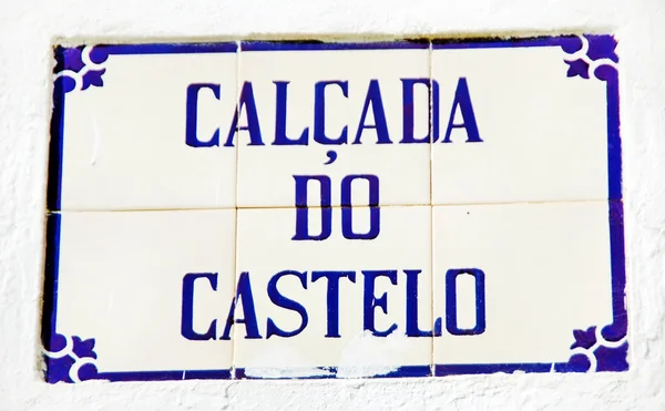 Portuguese tile plaque on old wall