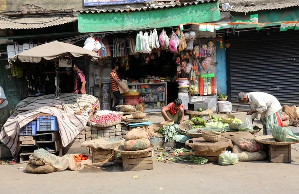 Street trader sell vegetables outdoor in Kolkata India