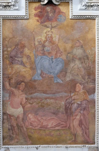 Virgin Mary with baby Jesus and Saints